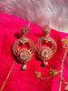 E0860 _Lovely ring shaped flowery design American Diamond studded danglers with beautiful art work.