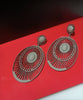 E0797_Lovely oval shaped trendy crafted danglers with a touch of stones.