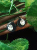 E0597_Elegant crafted studs with delicate work with a touch of stones.