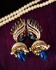 E0654_Gorgeous Crafted peacock design bead work jumkas embellished with stones with a touch of blue bead drop.