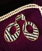 E0660_Classic knitted white & black oval shaped earrings with delicate craft work.