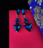 E0703_Dazzling triangular shaped ear drop hanging with a touch of blue stones.