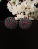 E0741_Classy german silver oxidized studs with delicate patterns with a touch of green and pink stones.