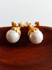 E0819_1 Lovely pearl studs with delicate design.