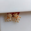 E0826_Lovely white stone studded flower design studs.