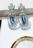 E0818_Beguiling American Diamond studded danglers with delicate stone work with a touch of blue stones.