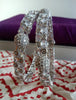 B051_ Classy Silver plated bangles studded with  American Diamond stones.