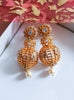 E0638_ Gorgeous Golden danglers with delicate art work with a touch of stones and pearls.