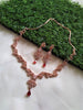 N0401_Lovely sleek design american diamond necklace with a touch of red stone drop.