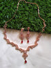 N0401_Lovely sleek design american diamond necklace with a touch of red stone drop.