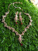 N0401_Lovely sleek design american diamond necklace with a touch of red stone drop.
