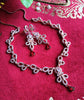 N0401_Lovely sleek design american diamond necklace with a touch of red stone drop.