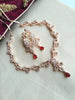 N0401_Lovely sleek design american diamond necklace with a touch of red stone drop.