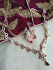 N0401_Lovely sleek design american diamond necklace with a touch of red stone drop.