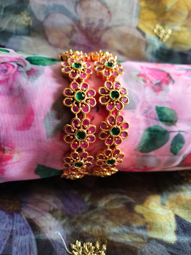 Gold bangles sales flower designs