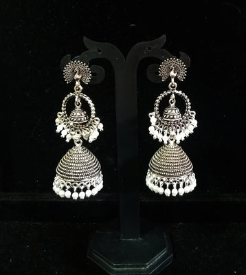 Silver oxidized earrings with never seen pattern and exclusive silver work for a stunning and stylish look.