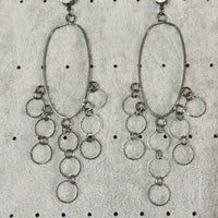 Stand-out dangler with beautiful black metal design.