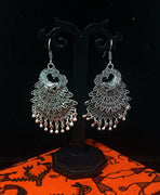 Silver oxidized earrings with exclusive silver peacock  work for a stunning and stylish look.