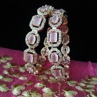 B0178_S_Elegant Rose Gold bangles embellished with American Diamond stones with a touch of dazzling pink stones.