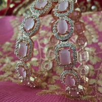 B0178_S_Elegant Rose Gold bangles embellished with American Diamond stones with a touch of dazzling pink stones.