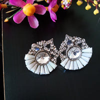 E0470_Trendy statement studs with a touch of dazzling stones.