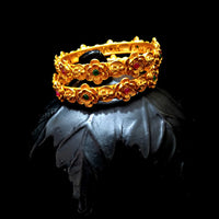 B041_Classic Gold plated flowery pattern bangles studded with pink and green ruby stones.