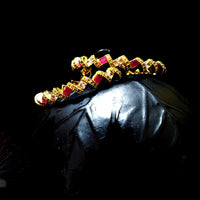 B019_Gorgeous Gold plated Bangles studded with white and pink ruby stones set of 2