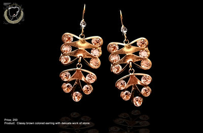 E0108_Classy bright golden colored earring with delicate work of stone