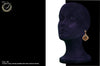 E040_Classy golden colored crafted earring with delicate work of white stone