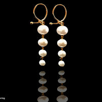 E057_Classy long designed earring with delicate work of white pearls