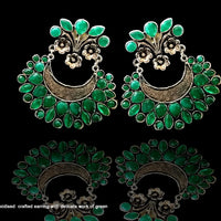 E063_Classy silver oxidized crafted earring with delicate work of green stones.