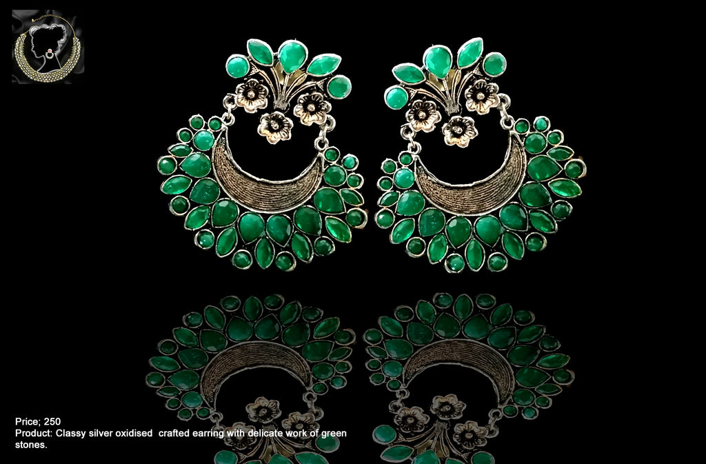 E063_Classy silver oxidized crafted earring with delicate work of green stones.