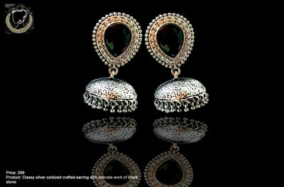 E066_Classy silver oxidized crafted jumki studded with black stones.