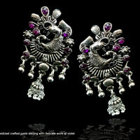 E086_Classy silver oxidized crafted jumki earring with delicate work of violet stones