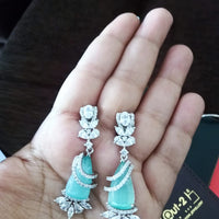 E0536 _Premium American Diamond earrings engraved with ocean green Emerald stone.
