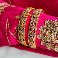 B065_Gorgeous Gold plated bangles  studded with  American Diamond  stones.