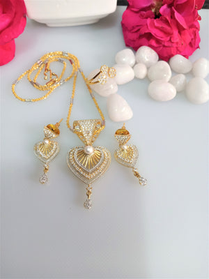 N079_Elegant Gold & Silver plated dual tone necklace set with earrings and ring studded with American Diamond stones.
