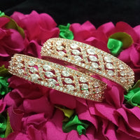 B0157_Elegant design Rose gold bangle studded with American Diamond stones.