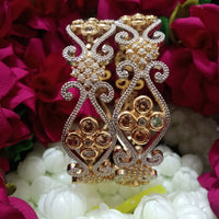 B0161_Gorgeous crafted bangles with floral design studded with American Diamond stones.
