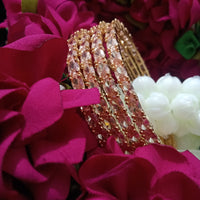 B0162_Gorgeous Golden crafted bangles with a touch of  American Diamond stones.