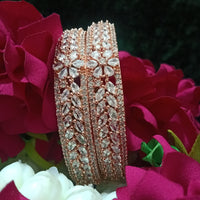 B0152_S_ Exquisite Rose Gold plated bangles with delicate art work studded with  American Diamond stones.