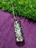 N0276_Trendy black metal chain with crafted cylinder shaped pendant filled with a touch of stones.
