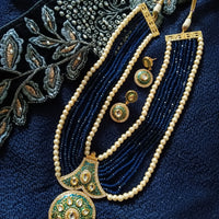 N0133_Gorgeous elaborated blue color Crystal  layered necklace set studded with kundan stones with a touch of pearls.
