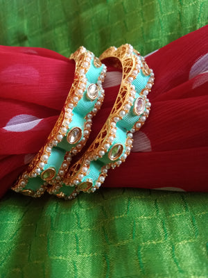 B0218_Gorgeous bangles with vibrant Meena work with a touch of semi precious stones.