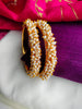 B0222_Lovely golden pearl bangles with delicate craftwork embellished with a bunch of pearls.