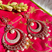 E0856_Classy designer Chandhbali style American Diamond studded danglers with beautiful art work with a touch of pearl drop.