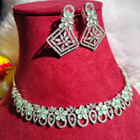 N0440_Elegant American Diamond stones embellished necklace set with delicate stone work studded with a touch of green stones.
