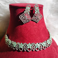 N0440_Elegant American Diamond stones embellished necklace set with delicate stone work studded with a touch of green stones.
