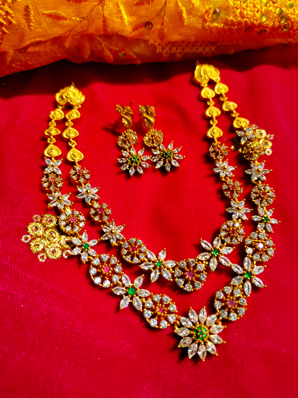 N0465_Gorgeous  gold plated American Diamond stones embellished necklace set with delicate stone work with a touch of red & green ruby stones.