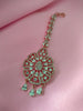 M026_Classic flower design oval shaped rose gold American diamond studded Maang tika with delicate stone work.
